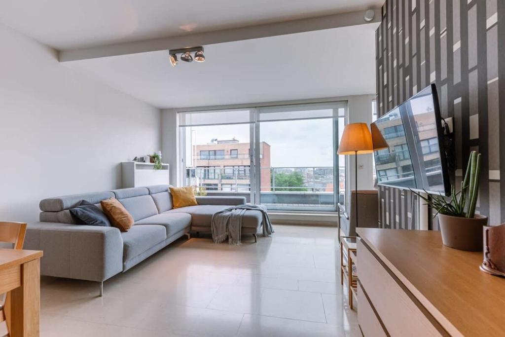 Posezení v ubytování Huswell - Charming apartment near the beach with balcony