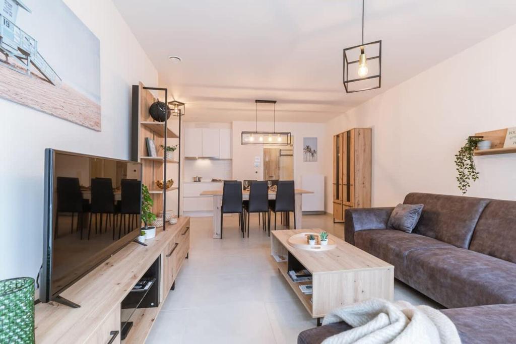 Posezení v ubytování Huswell - Bright apartment only 5 minutes from the beach