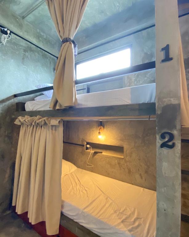 Postel nebo postele na pokoji v ubytování Katre Siargao - SELF CHECK-IN Budget Hostel