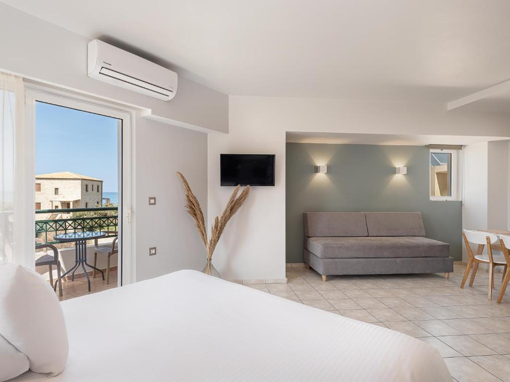 Postel nebo postele na pokoji v ubytování Alexia Beach Hotel