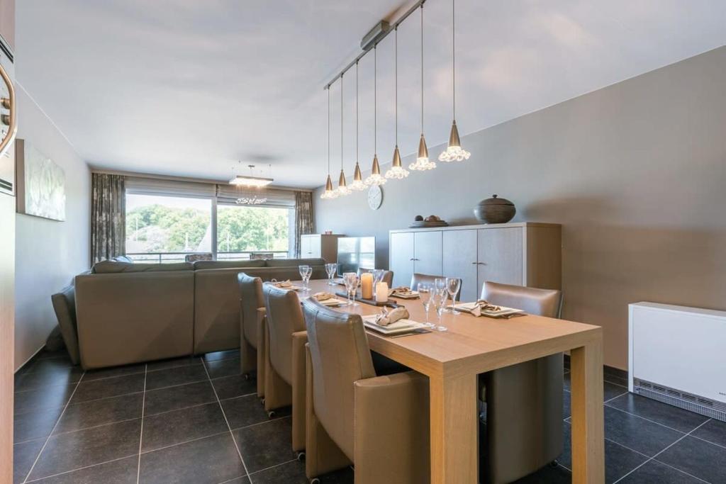 Kuchyň nebo kuchyňský kout v ubytování Huswell - Bright apartment with parking near the beach