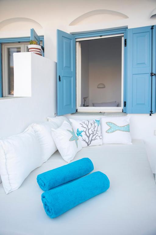 Кровать или кровати в номере Archipelago Sifnos - Seaside Accommodation