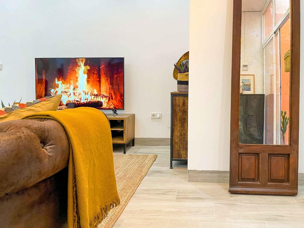 Televízia a/alebo spoločenská miestnosť v ubytovaní Estiloso apartamento en el centro de Alicante