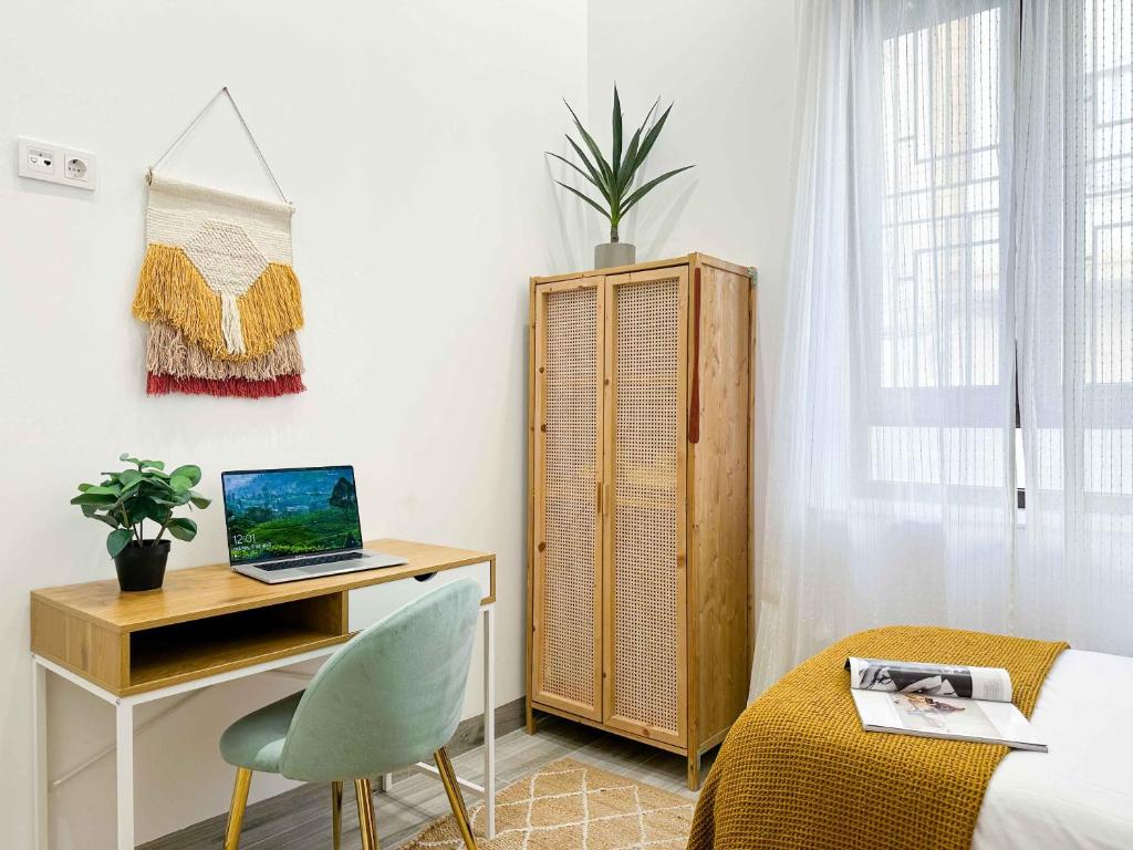 Televízia a/alebo spoločenská miestnosť v ubytovaní Estiloso apartamento en el centro de Alicante