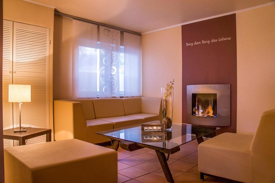 Posezení v ubytování Hotel Grüner Jäger