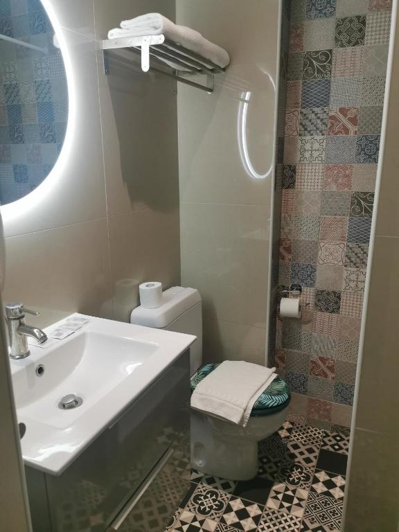 Koupelna v ubytování Hôtel Gloria
