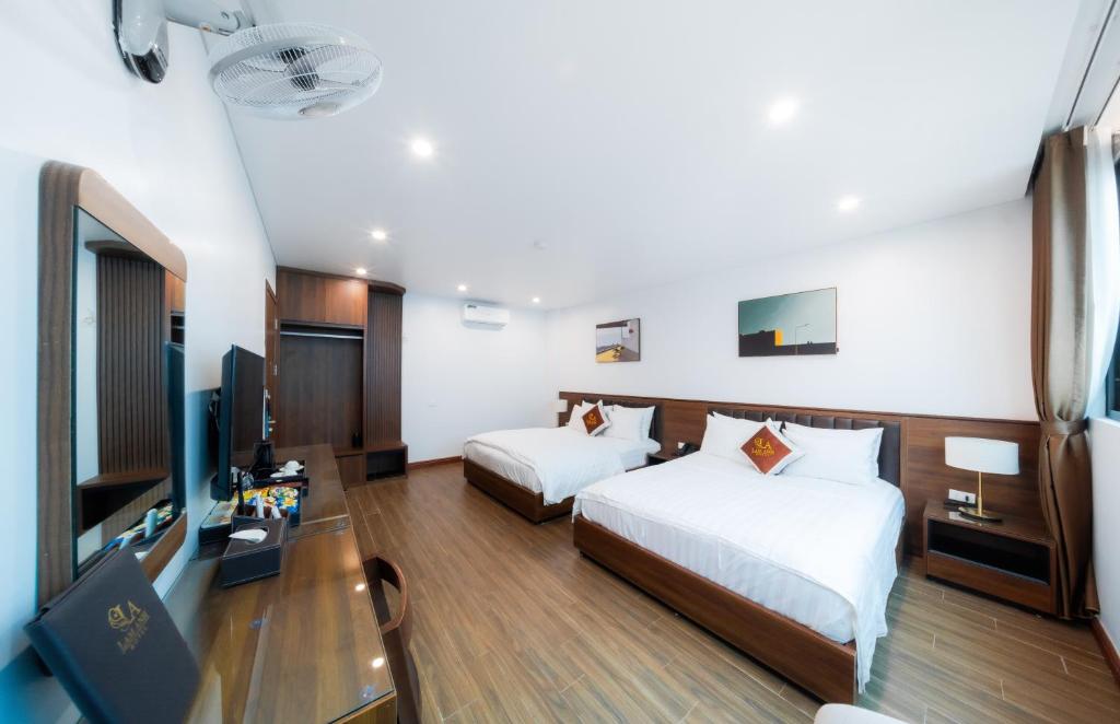 Postel nebo postele na pokoji v ubytování Lam Anh Hotel 6 Ngoại Giao Đoàn BT4-10