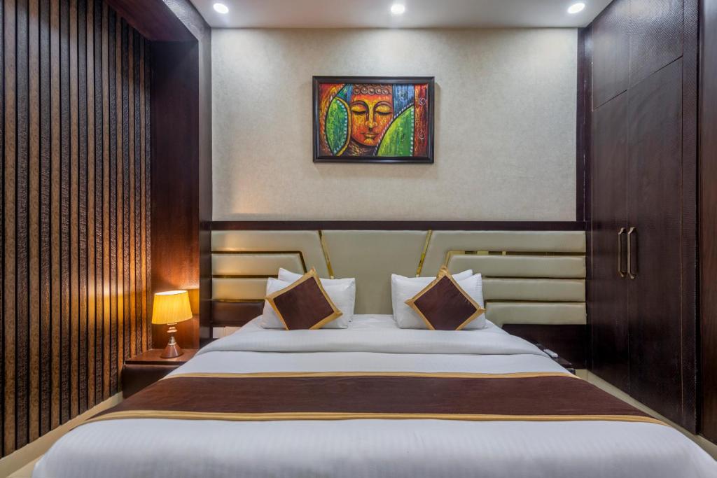 Postel nebo postele na pokoji v ubytování Shree Jee Hotel - NIT Faridabad