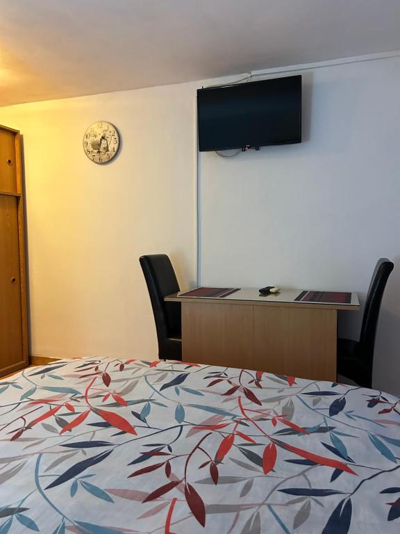 TV a/nebo společenská místnost v ubytování Apartments Jankovic