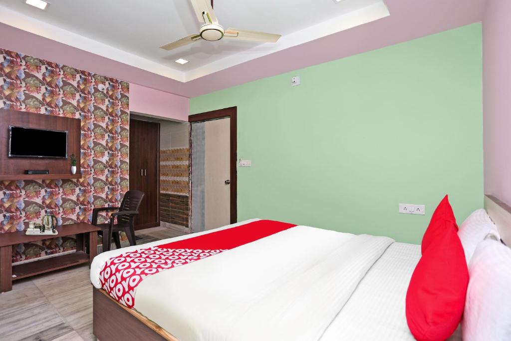 TV a/nebo společenská místnost v ubytování Collection O Aryan hotel