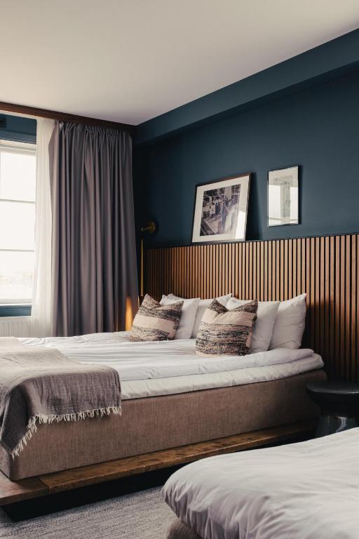 Postel nebo postele na pokoji v ubytování Hotel Strana
