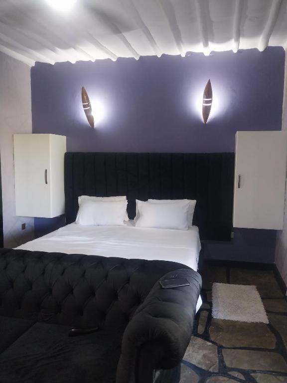 Voodi või voodid majutusasutuse Sagwe Riviera Diani, Kenya toas