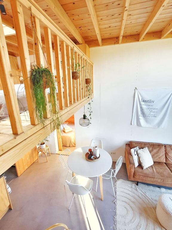 Posezení v ubytování Tiny House Lantliv Oostkapelle, bij de boer