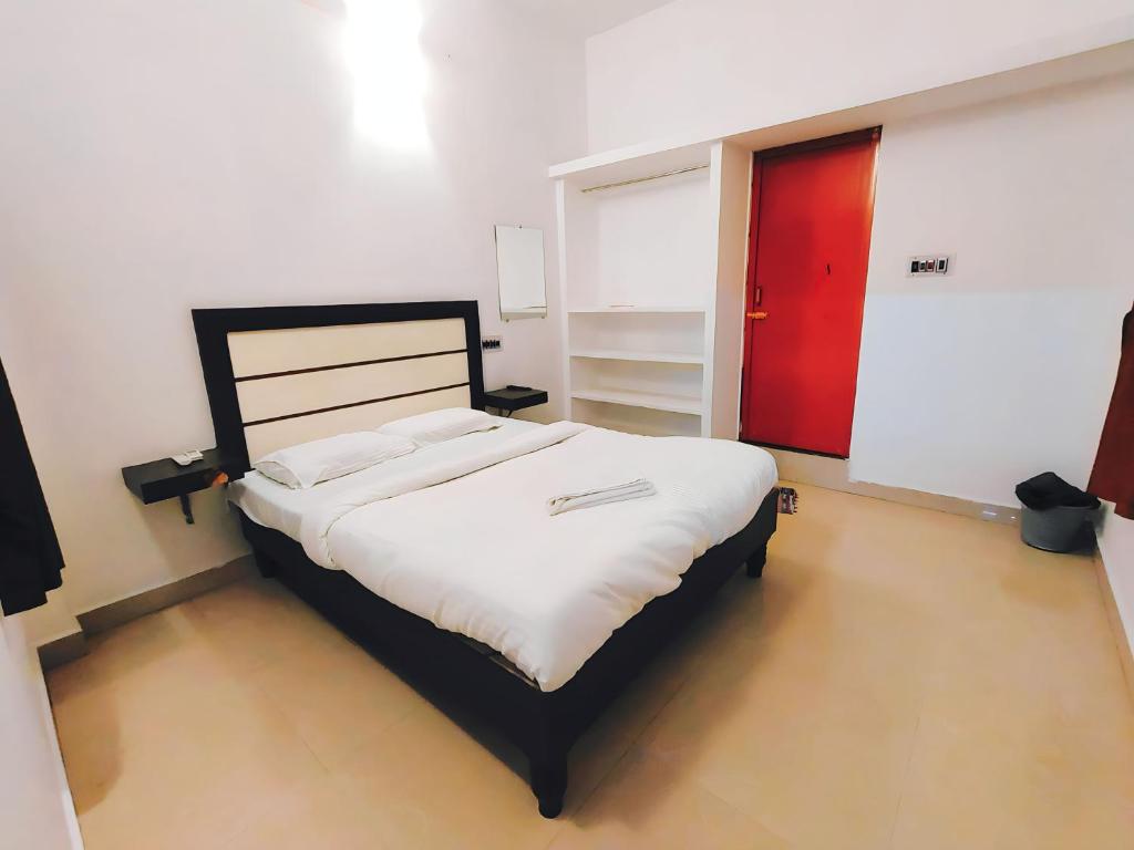 Postel nebo postele na pokoji v ubytování Le Dreamy Residency