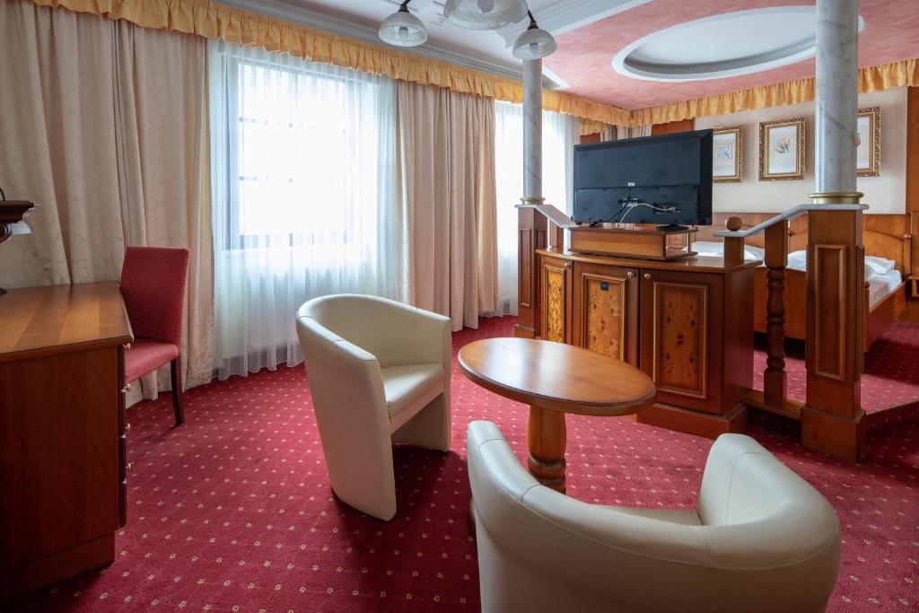 Televiisor ja/või meelelahutuskeskus majutusasutuses Workers Castle Apartments für die besten Monteure