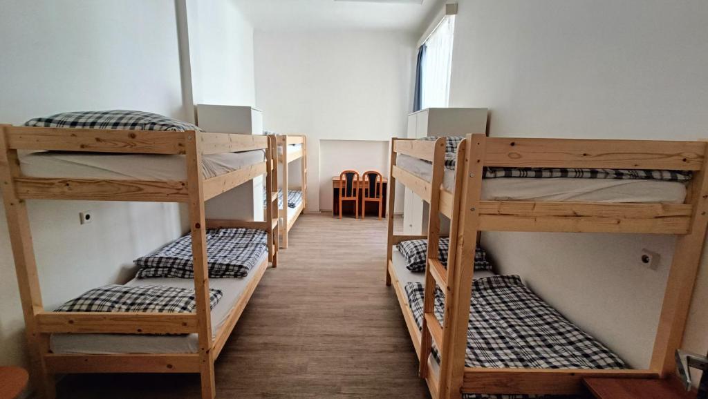 Postel nebo postele na pokoji v ubytování A Plus Hostel - Centrum