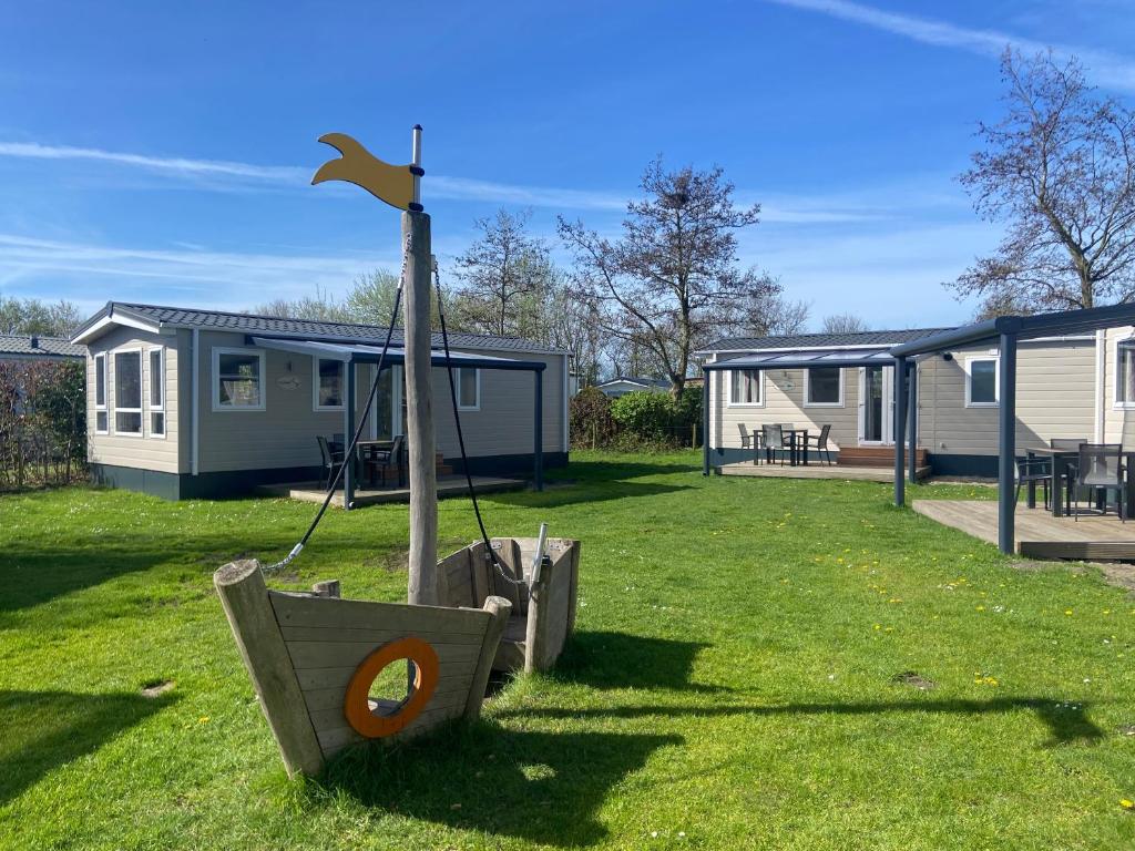 Zahrada ubytování Camping de Duinhoeve Chalet Vogel not for companies