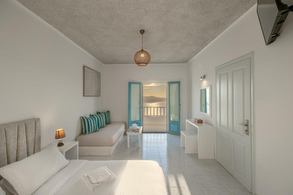 Ένα ή περισσότερα κρεβάτια σε δωμάτιο στο Nevma Suites