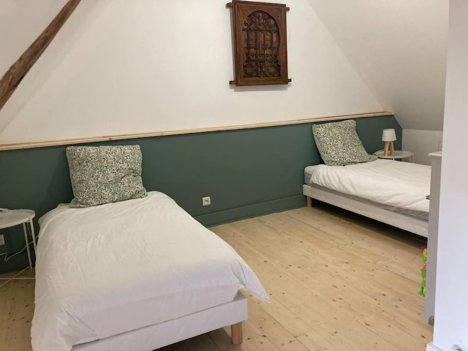 Cama o camas de una habitación en La Tibourdière : au coeur du pays des châteaux, maison au calme entre vignes et champ