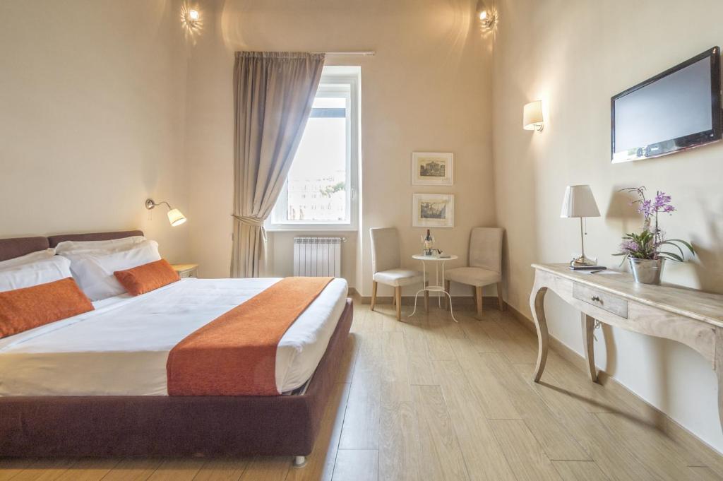 Letto o letti in una camera di Little Queen Suite
