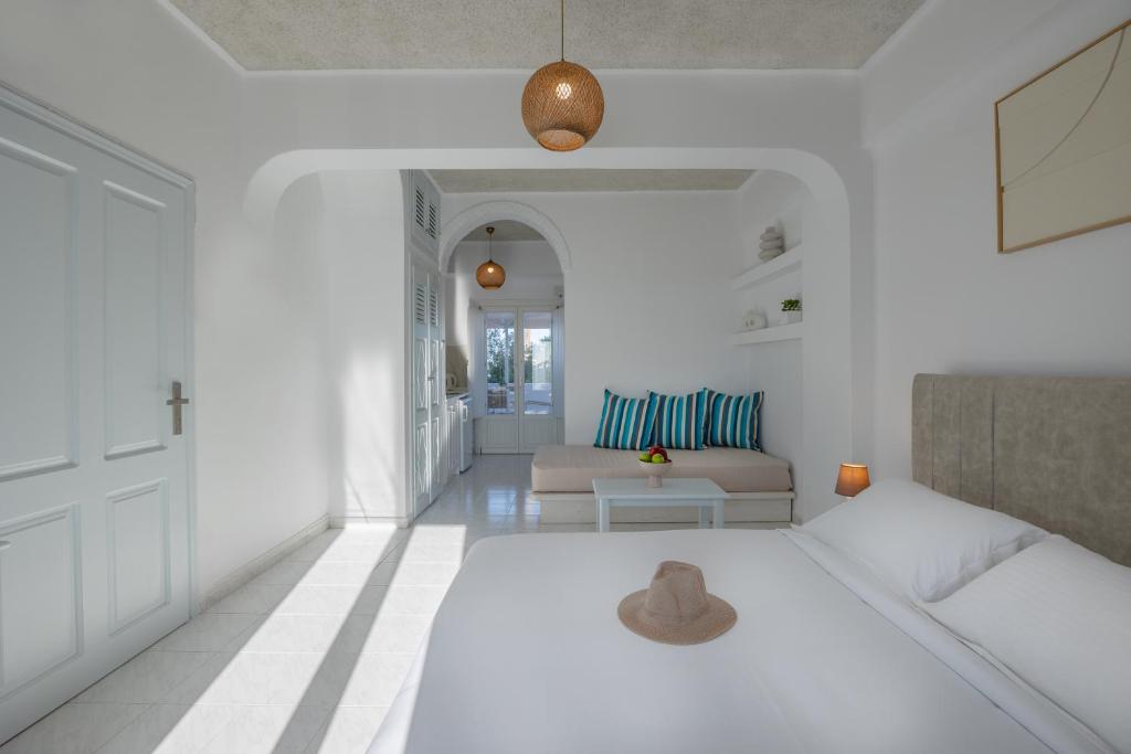 Ένα ή περισσότερα κρεβάτια σε δωμάτιο στο Nevma Suites