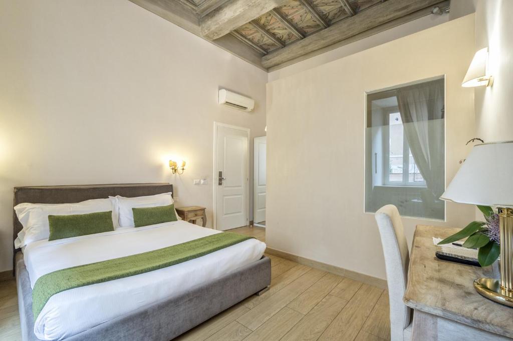 Letto o letti in una camera di Little Queen Suite