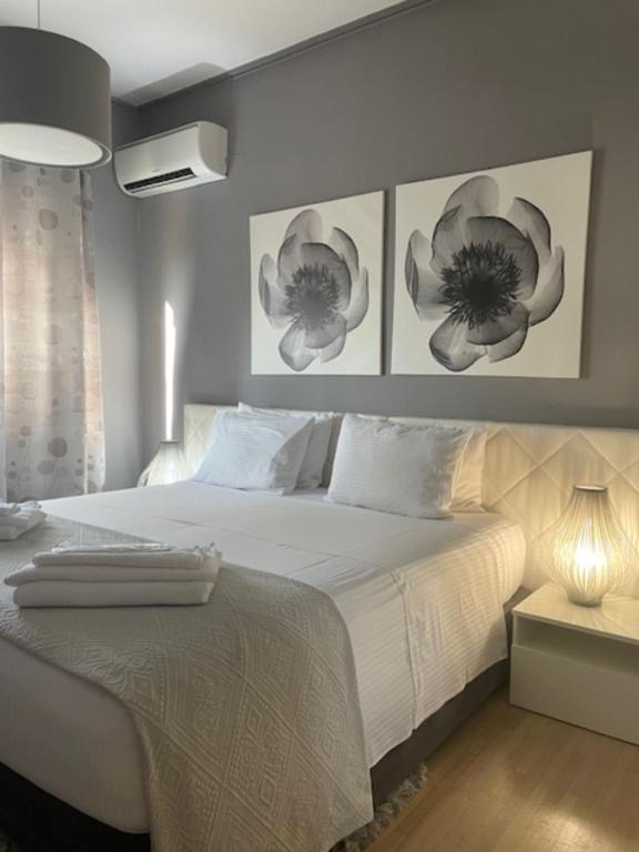 Posteľ alebo postele v izbe v ubytovaní Urban Residence