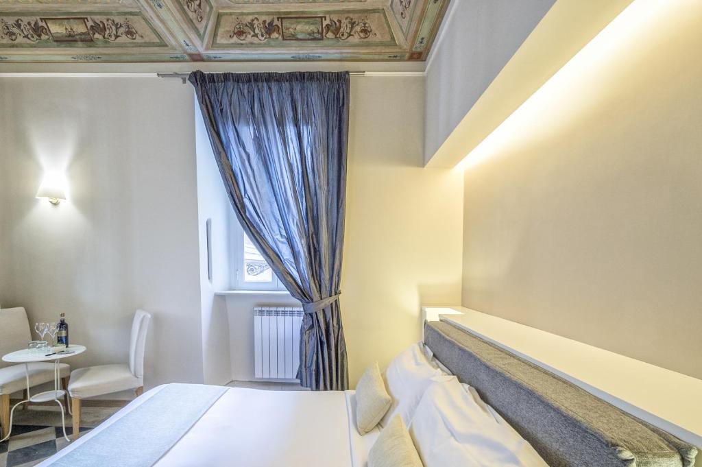 Letto o letti in una camera di Little Queen Suite