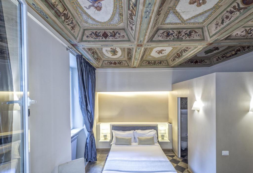 Letto o letti in una camera di Little Queen Suite