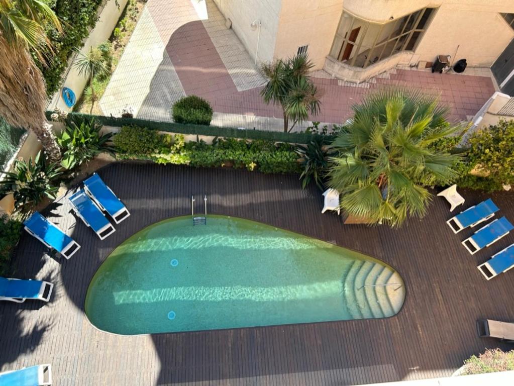 Bazén v ubytovaní Fabuloso apartamento familiar con piscina en Salou alebo v jeho blízkosti