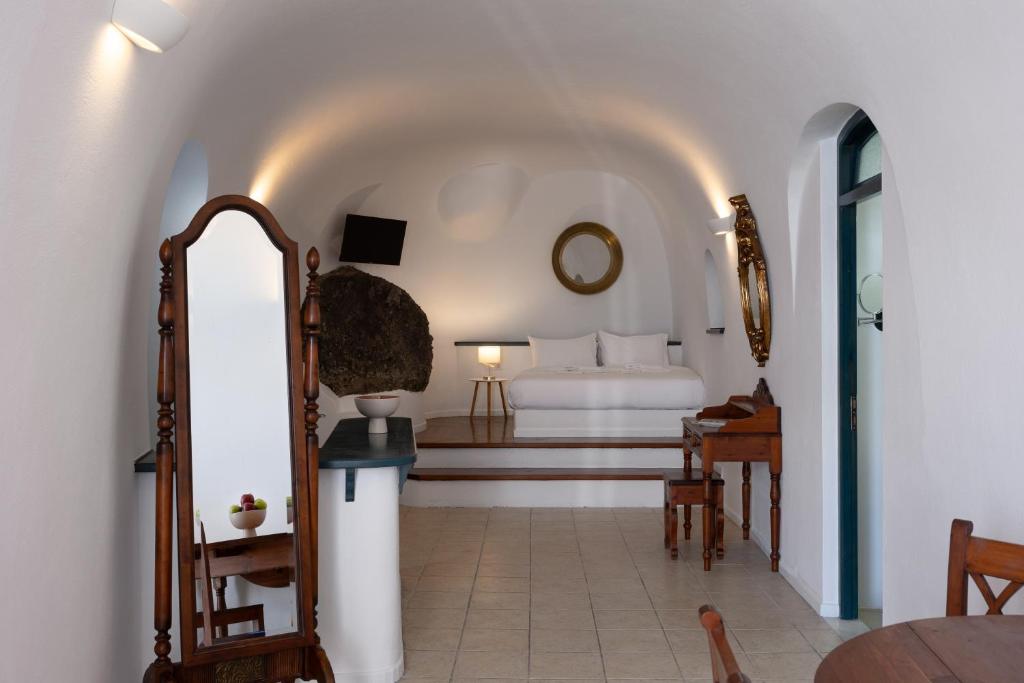 Ένα ή περισσότερα κρεβάτια σε δωμάτιο στο Nevma Suites