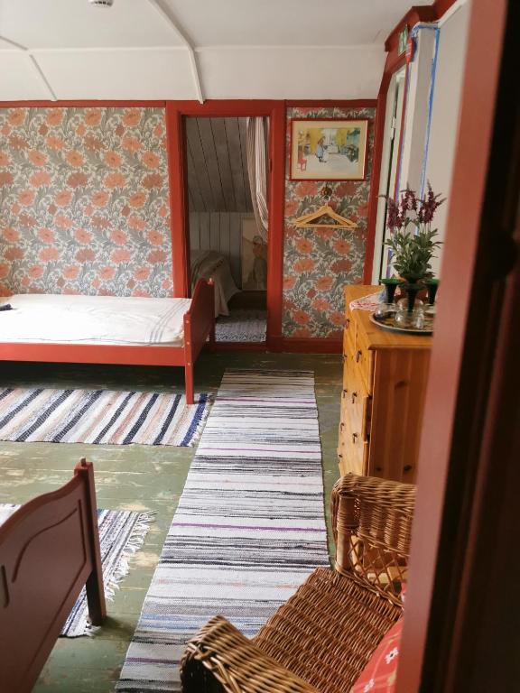 Postel nebo postele na pokoji v ubytování Björsjöås Vildmark - room in the main house