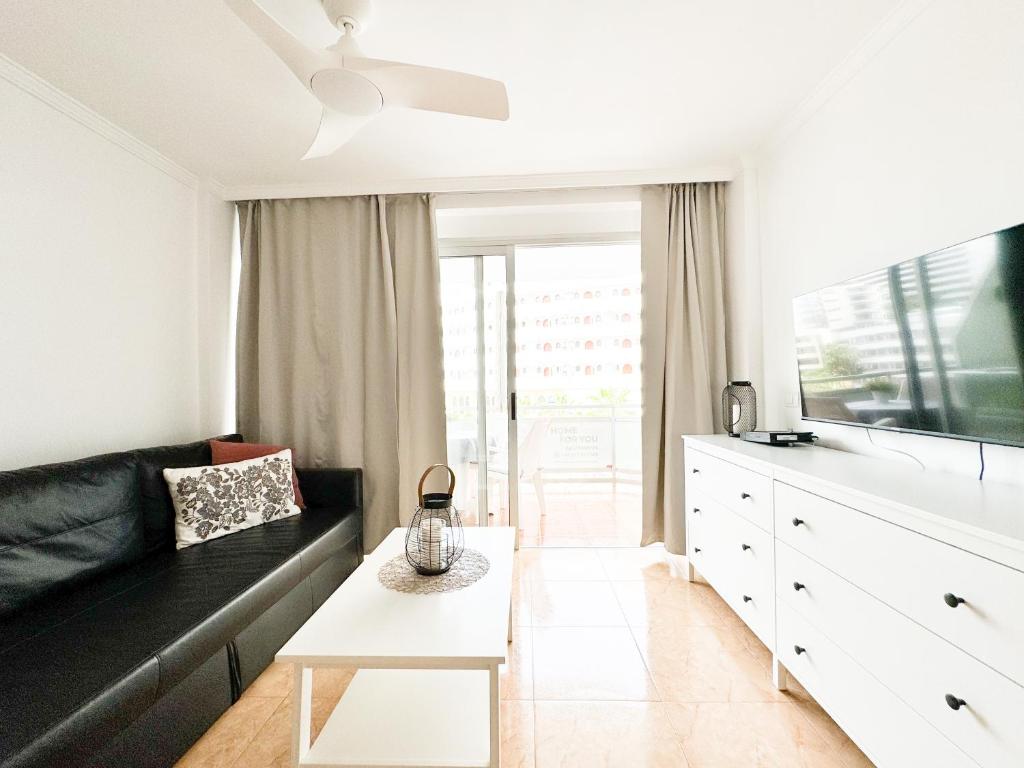 TV a/nebo společenská místnost v ubytování H4U Apartments - Playa & Dunas