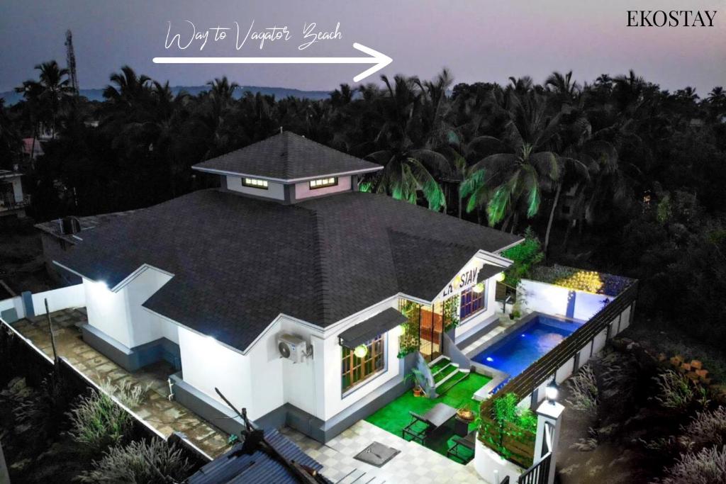 an overhead view of a house with a swimming pool at EKO STAY- CASA VAGA in Vagator