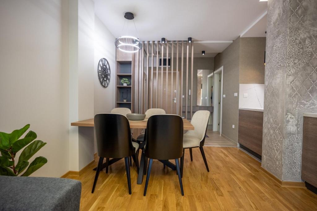 a dining room with a table and chairs at M3 in Kraljevo