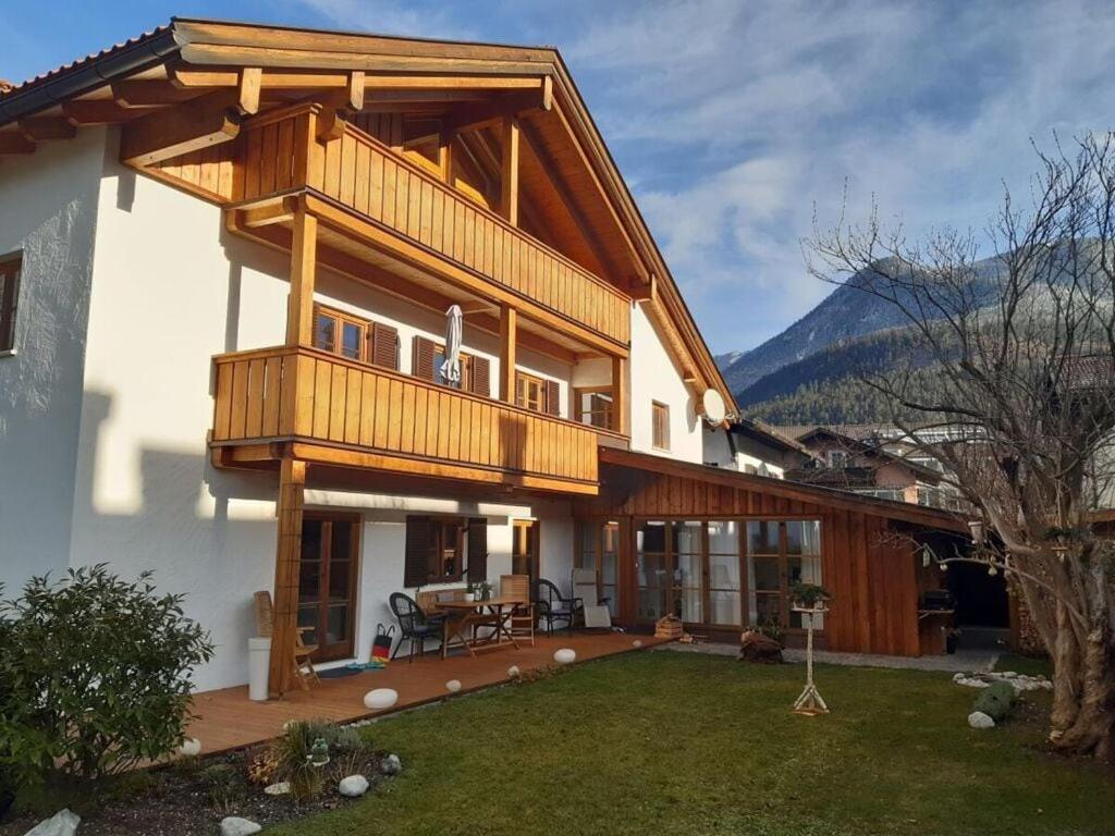 a large house with a balcony on top of it at Favorite place 1 in Garmisch-Partenkirchen
