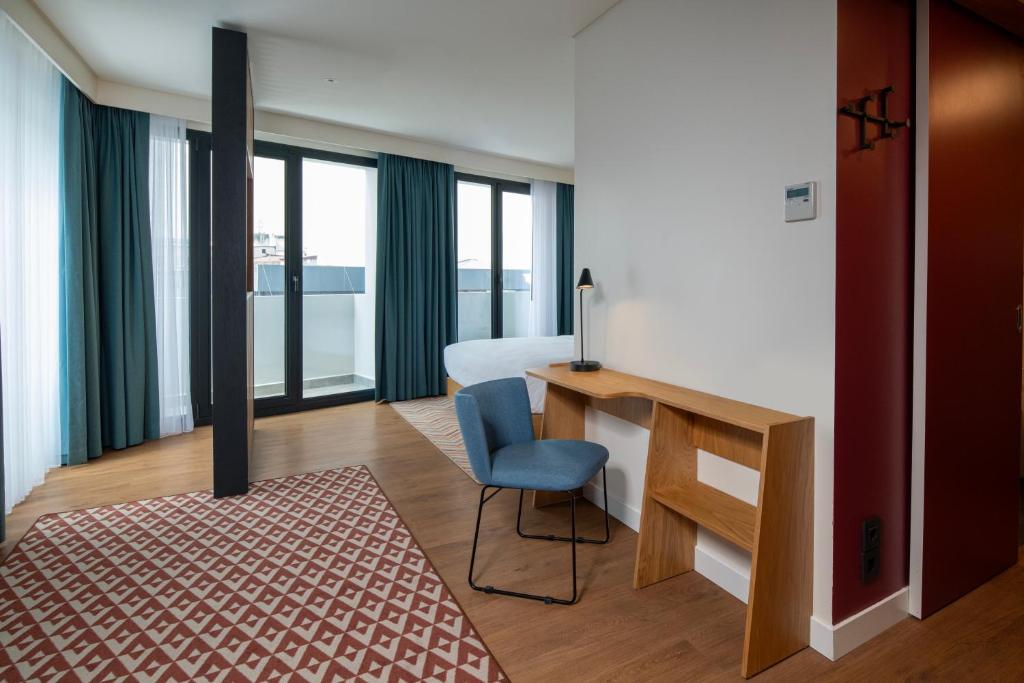 Postel nebo postele na pokoji v ubytování Hampton By Hilton Istanbul Sirkeci