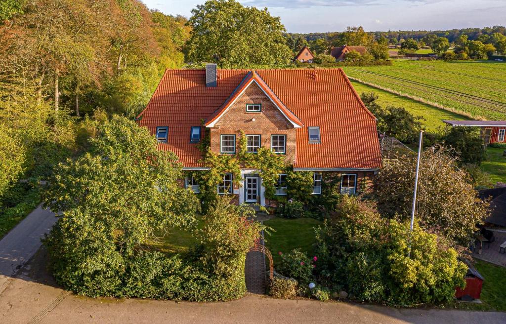 an aerial view of a house with an orange roof at Bauerngarten in Grömitz