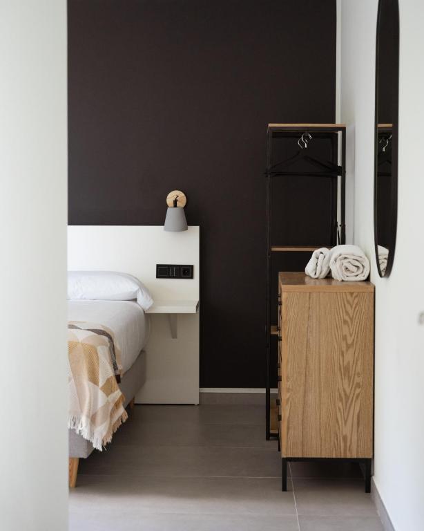Postel nebo postele na pokoji v ubytování Apartamentos Las Indianas