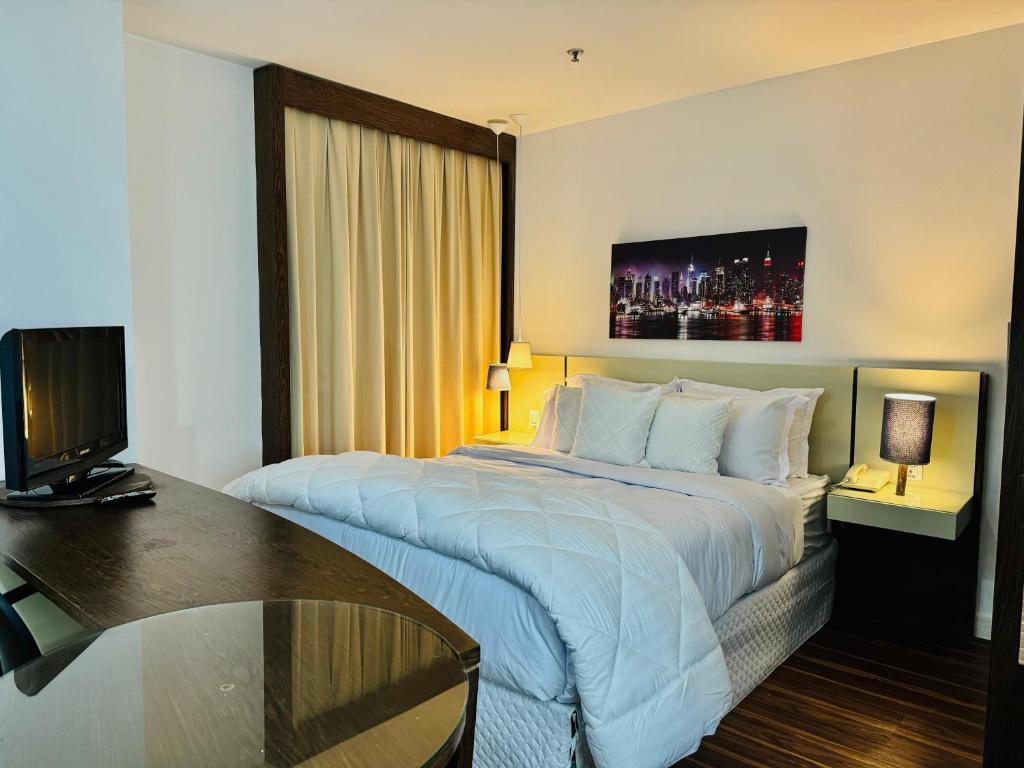 Säng eller sängar i ett rum på Hotel - Av Paulista - São Paulo