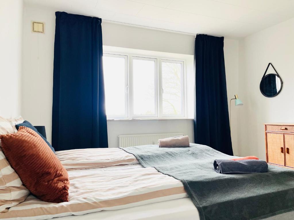 Кровать или кровати в номере Scandinavian Apartment Hotel - Torsted - 2 room apartment