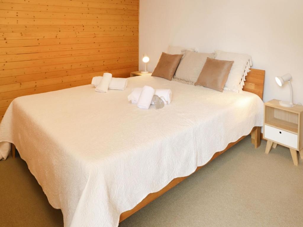 Postel nebo postele na pokoji v ubytování Apartment Colline 8 by Interhome