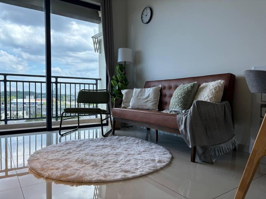 Et opholdsområde på Comfort Living at Country Garden Central Park 1-4pax