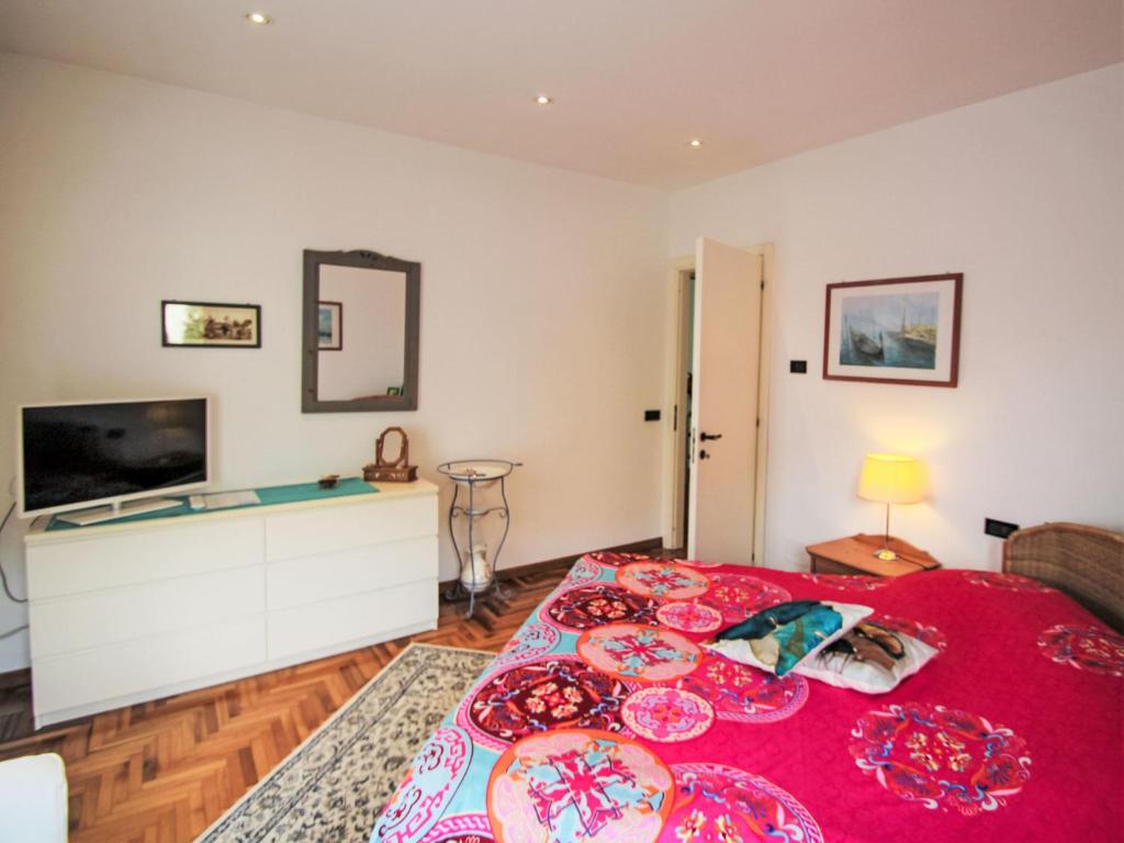 Łóżko lub łóżka w pokoju w obiekcie Apartment Il Ciliegio by Interhome