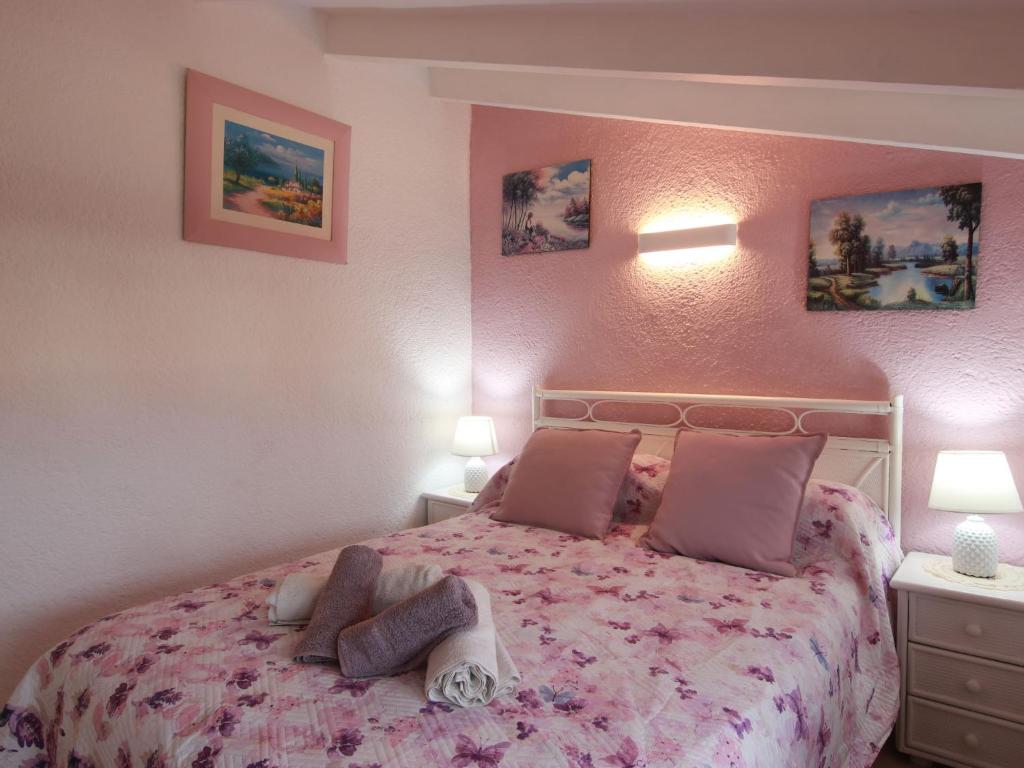Postel nebo postele na pokoji v ubytování Holiday Home Los Mulet by Interhome