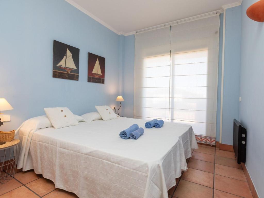 Postel nebo postele na pokoji v ubytování Apartment Port Pals A I by Interhome