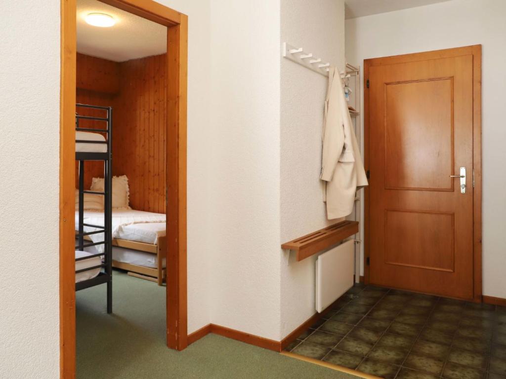 Postel nebo postele na pokoji v ubytování Apartment Le Sporting 213 by Interhome
