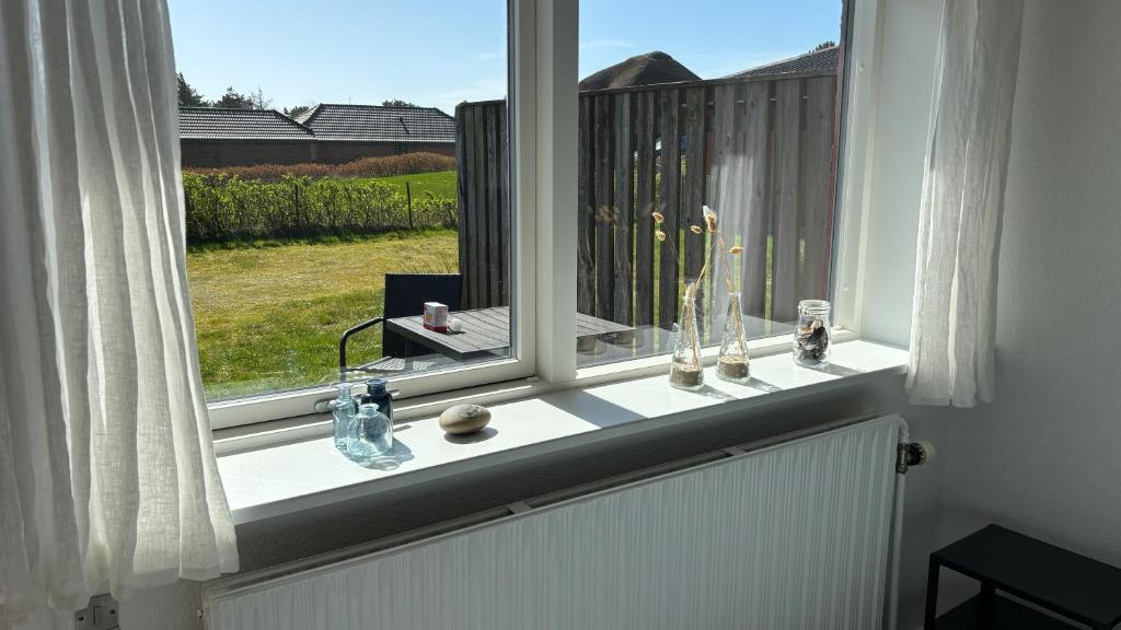 Balkón nebo terasa v ubytování Søndervig Camping & Cottages