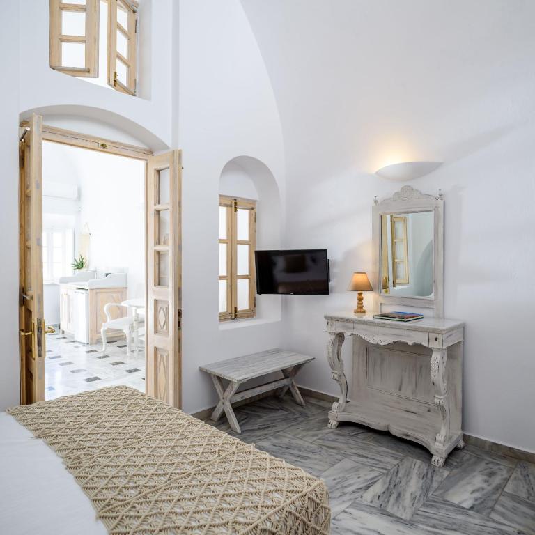 Postel nebo postele na pokoji v ubytování MyBoZer Hotel Kallisto