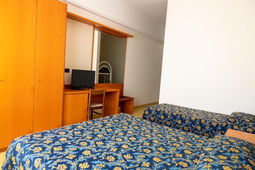 Postel nebo postele na pokoji v ubytování HOTEL SOLE